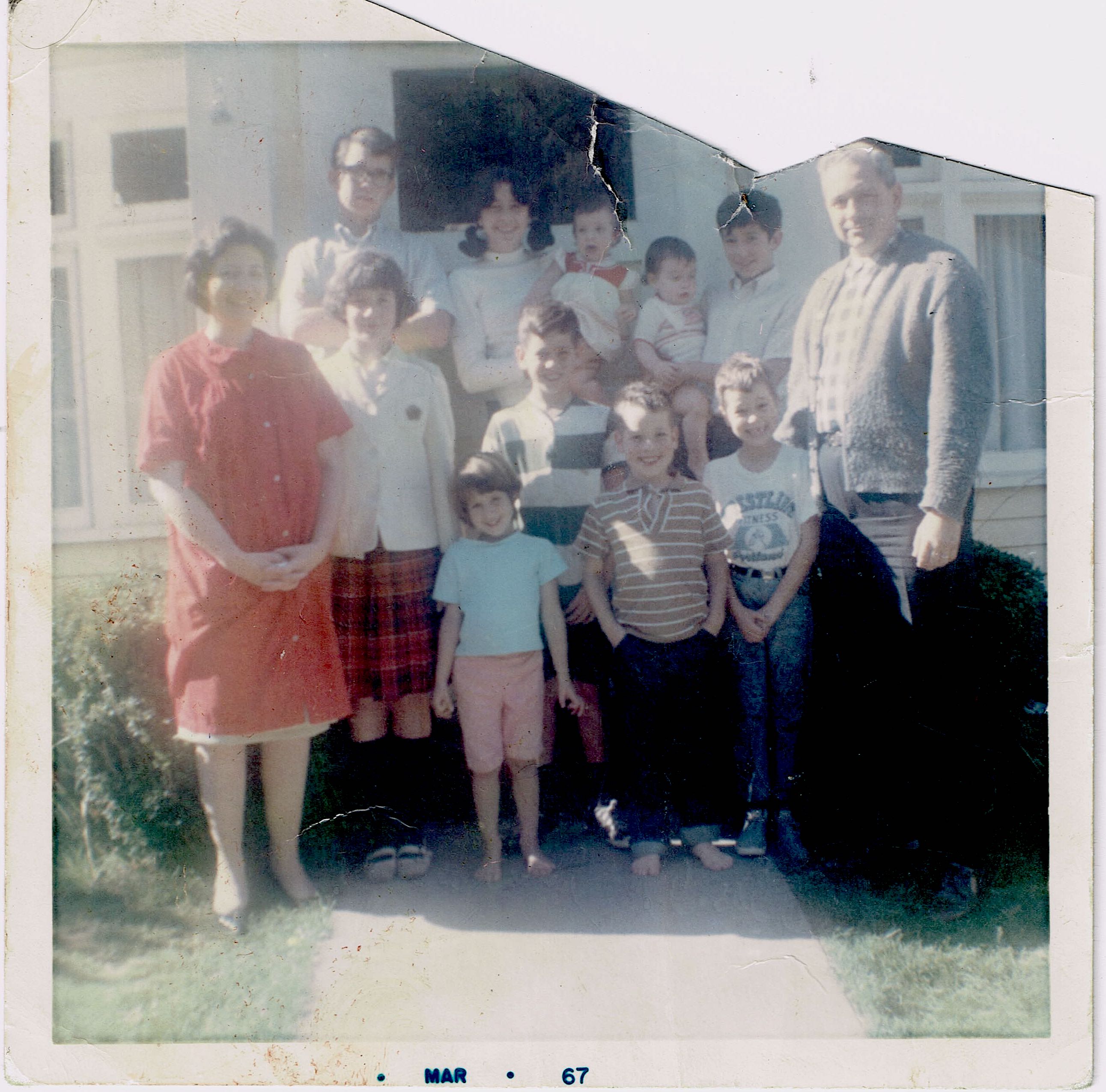 This photo is on the back cover of DnG Binder B.  since there was such a hubbub about it, I had to see if Greg was right, that it was in Binder B. 
He has an eidetic memory, I think.  Don't know why the upper part is cropped.  March of 67.  Back notes say Mom and Dad are 40. 